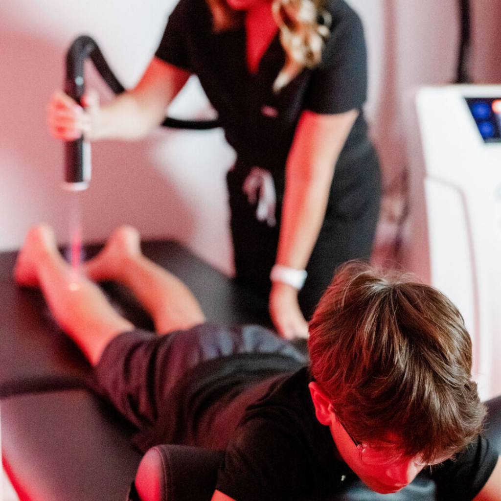 A boy receiving targeted cryotherapy in Trinity FL
