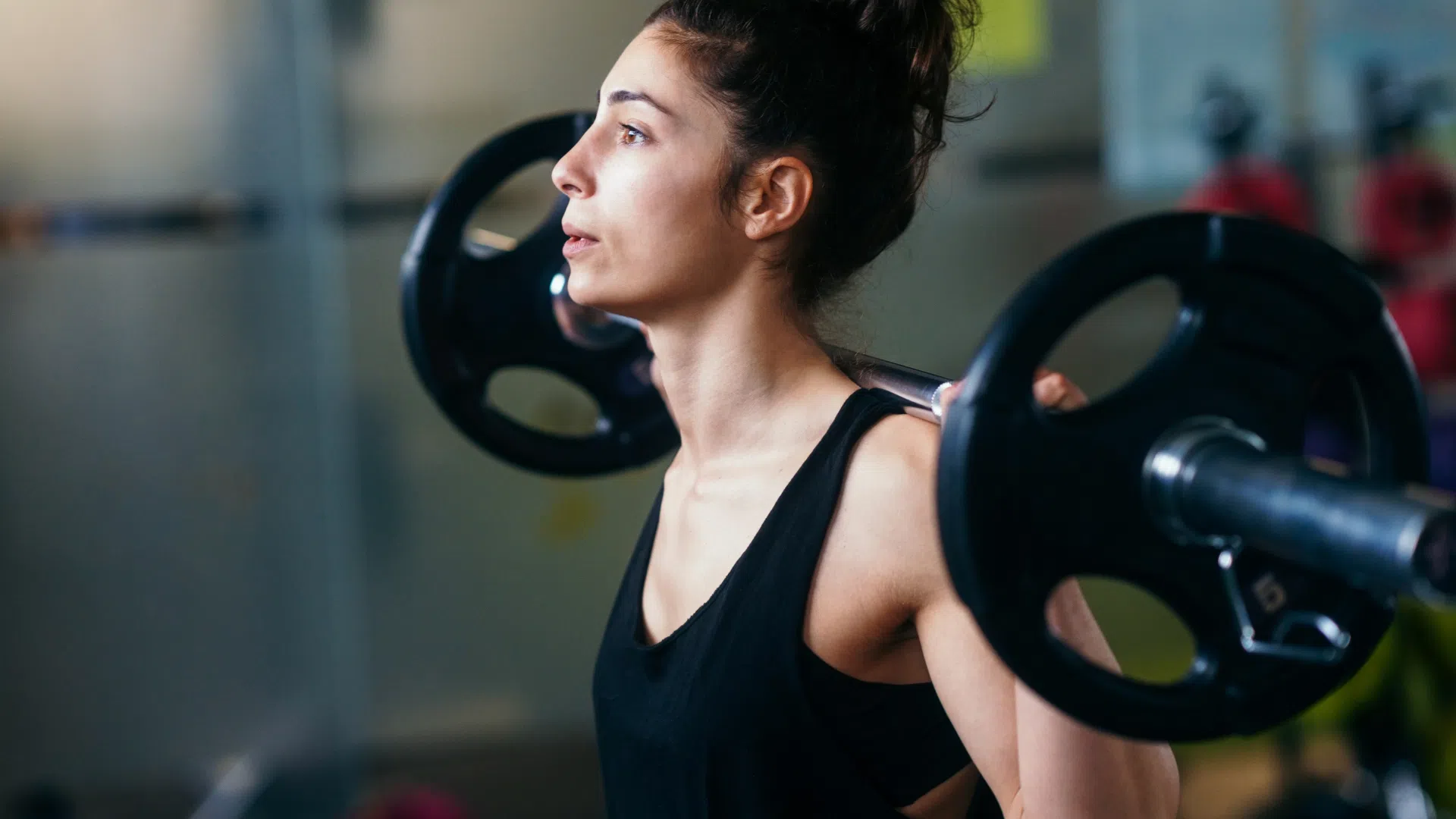 a woman over 35 lifting weights